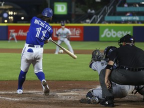 Bo Bichette hits a three-run home run during the sixth inning against the Seattle Mariners.