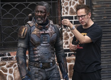 DRIS ELBA and writer/director JAMES GUNN on the set of THE SUICIDE SQUAD.