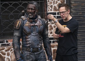 DRIS ELBA and writer/director JAMES GUNN on the set of THE SUICIDE SQUAD.