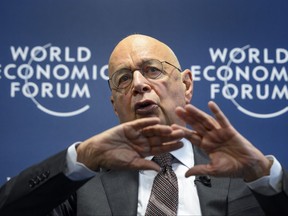 World Economic Forum (WEF) founder and executive chairman Klaus Schwab gestures during a news conference on the programme of the Davos World Economic Forum annual meeting at the Forum's headquarters in Cologny, near Geneva, on Jan. 13, 2015.