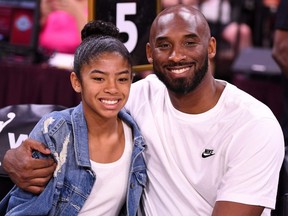 Kobe Bryant and daughter Gianna are pictured during the WNBA All-Star Game at the Mandalay Bay Event Center in Las Vegas on July 27, 2019.