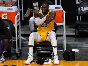 Los Angeles Lakers forward LeBron James (23) reacts against the Phoenix Suns at Staples Center.