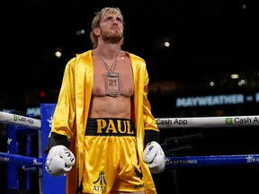 Logan Paul stands in the ring prior to an exhibition boxing match against Floyd Mayweather Jr. at Hard Rock Stadium.