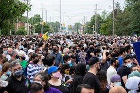 Londoner’s attend a vigil for the victims of the deadly vehicle attack on five members of the Canadian Muslim community in London, Ont., June 8, 2021.