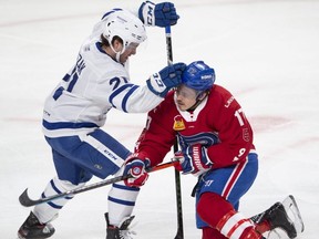 The  Toronto Marlies' -- former defenceman Joseph Duszak at left -- hired Ryan Hardy as Senior Director of Minor League Operations. The Canadian Press