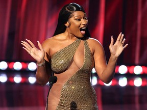 Megan Thee Stallion accepts the Best Collaboration award for 'Savage' (Remix) onstage at the 2021 iHeartRadio Music Awards at The Dolby Theatre in Los Angeles, California, on May 27, 2021.