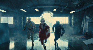 David Dastmalchian as Polka Dot Man, Margot Robbie as Harley Quinn and Idris Elba as Bloodsport in The Suicide Squad.