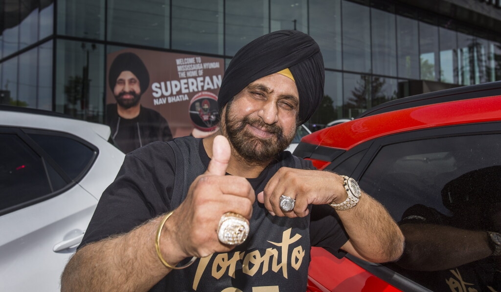 Toronto Raptors Superfan Nav Bhatia with his 2019 championship ring (left) and his hall of fame ring at his Mississauga Hyundai dealership in Mississauga, Ont. on Wednesday, June 2, 2021.  Toronto Raptors Superfan Nav Bhatia with his 2019 championship ring (left) and his hall of fame ring at his Mississauga Hyundai dealership in Mississauga, Ont. on Wednesday, June 2, 2021.