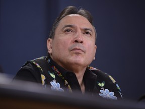 Assembly of First Nations (AFN) National Chief Perry Bellegarde is joined by First Nations leaders at a press conference at the National Press Theatre in Ottawa on Tuesday, Feb. 18, 2020.