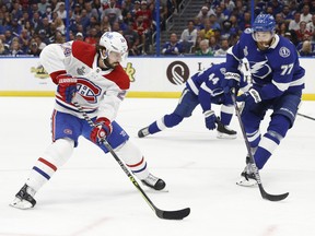 Montreal Canadiens left wing Phillip Danault (left) tries to get around Tampa Bay Lightning defenceman Victor Hedman during Game 1 of the Stanley Cup final on Monday. The Lightning were able to negate Danault during the series opener.
