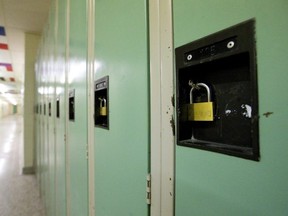 Lockers in an empty school hallway