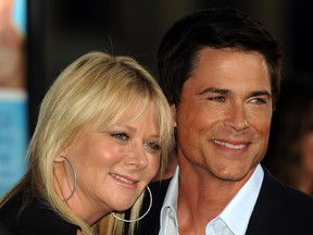 Actor Rob Lowe arrives with his wife Sheryl Berkoff at the premiere of “The Invention of Lying” at the Grauman’s Chinese Theatre in Hollywood, Calif., on Sept. 21, 2009.
