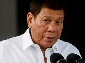 Philippines President Rodrigo Duterte speaks during the arrival ceremony for the first COVID-19 vaccines to arrive in the country, at Villamor Air Base in Pasay, Metro Manila, Philippines, Feb. 28, 2021.