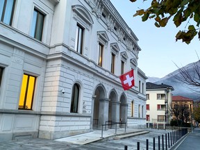 Switzerland's flag is displayed on the Swiss Federal Criminal Court (Bundesstrafgericht) building in Bellinzona, Switzerland, December 3, 2020.