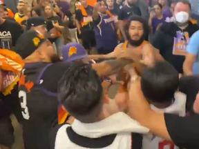 Phoenix Suns and LA Clippers fans brawl.