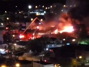 A screenshot from a video shows a five-alarm fire at an Etobicoke bakery late Tuesday night.