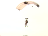 Rian Kanouff of Omaha, Nebraska makes 60 naked skydiving jumps in 24 hours.