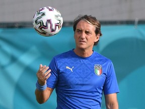Italy coach Roberto Mancini watches a training session on June 19, 2021.