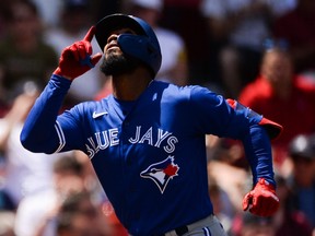 Teoscar Hernandez of the Toronto Blue Jays celebrates after hitting his second home run of the day in the fourth inning against the Boston Red Sox at Fenway Park on June 13, 2021 in Boston.
