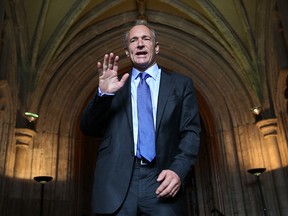 Sir Tim Berners-Lee inventor of the World Wide Web waves to photographers as he arrives at Guildhall to receive an Honorary Freedom of the City of London award on September 24, 2014 in London.