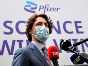 Prime Minister Justin Trudeau talks to the press at the end of a visit with his Belgian counterpart of Europe's largest Pfizer-BioNTech Covid-19 vaccine production site on June 15, 2021 in Puurs.