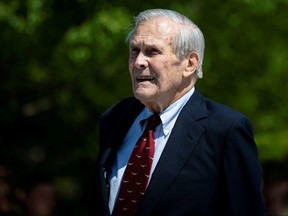 Former U.S. Defense Secretary Donald Rumsfeld looks on after former U.S. President George W. Bush placed a wreath during the 18th anniversary of September 11 attacks at the Pentagon in Arlington, Va., Sept. 11, 2019.