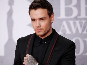 Liam British singer-songwriter Liam Payne poses on the red carpet on arrival for the BRIT Awards 2019 in London on February 20, 2019.