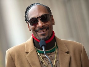 In this file photo taken on November 19, 2018 Rapper Snoop Dogg attends the ceremony honoring him with a Star on Hollywood Walk of Fame, in Hollywood, California.