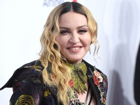 In this file photo taken on December 9, 2016 Madonna attends the Billboard Women in Music 2016 event in New York City.