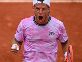 Argentina's Diego Schwartzman celebrates after winning against Germany's Jan-Lennard Struff during their men's singles fourth round tennis match on Day 9 of The Roland Garros 2021 French Open tennis tournament in Paris on June 7, 2021.