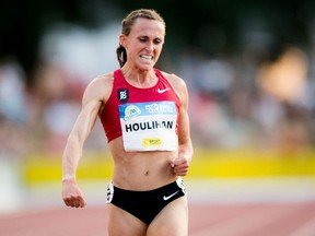 In this file photograph taken on July 21, 2018, U.S. athlete Shelby Houlihan celebrates after winning the women’s 5000m at the 39th edition of the ‘Nacht van de Atletiek (EA Classic Meeting) athletics meeting in Heusden-Zolder.