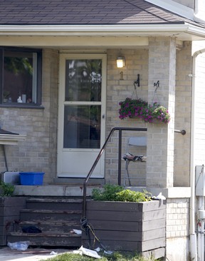 Blood can be seen on the front porch and steps after a man, 29, was shot dead at a townhouse complex on Smith Lane in Ajax on Wednesday, June 2, 2021. The victim was shot at the rear of a row of townhomes but was treated on the front porch.