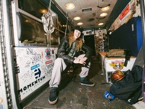 Canadian skateboarder Andy Anderson poses in the back of the 1997 Ford ambulance that he usually drives. Brandon Artis photo