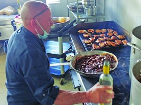 Long-time Woodbine  jockey Ray Sabourin fires up some tasty meals for iron ore workers up in Fermont, Que., for the ESS food group.