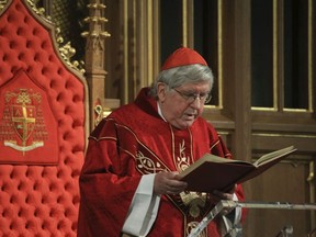 Cardinal Thomas Collins of the Roman Catholic Archdiocese of Toronto delivers the Good Friday liturgy at St. Michael's Cathedral Basilica.