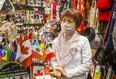 The Souvenir Market owner Jenny Huang at her shop at St. Lawrence Market in Toronto, Ont. on Wednesday, June 23, 2021.