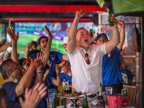 Rosario cheers while watching Italy face Turkey during EURO 2020 at Cafe Diplomatico Restaurant & Pizzaria, located at Clinton and College Sts. in Toronto, Ont., as Ontario moved to Step 1 of reopening on Friday, June 11, 2021.