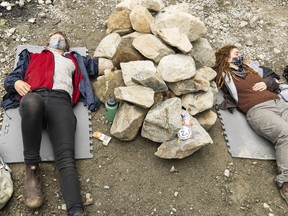 Two protesters locked themselves under a pile of rocks to block the path of loggers in 2000 Block in protest of logging old-growth forest in British Columbia, near Port Renfrew B.C., on May 25, 2021.
