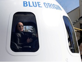 Amazon and Blue Origin founder Jeff Bezos addresses the media about the New Shepard rocket booster and Crew Capsule mockup at the 33rd Space Symposium in Colorado Springs, Colorado, United States April 5, 2017.