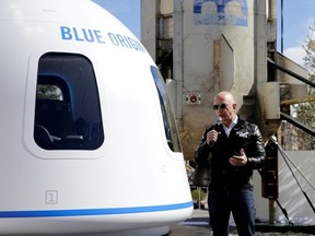 Amazon and Blue Origin founder Jeff Bezos addresses the media about the New Shepard rocket booster and Crew Capsule mockup at the 33rd Space Symposium in Colorado Springs, Colorado, United States April 5, 2017.