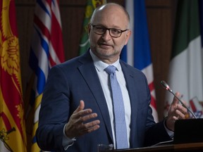 Justice Minister David Lametti responds to a  question during a news conference in Ottawa, May 7, 2021.
