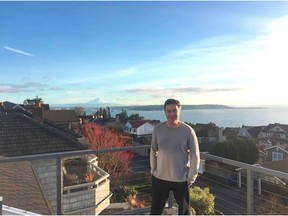 “In general it’s a laid-back atmosphere out here,” says Seattle Times writer Geoff Baker, shown here on the balcony of his home. "There’s some great natural sites to see. You can buy property out here where you’ll see mountains, you’ll see water."