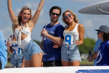Tyler Johnson of the Tampa Bay Lightning, center, during the boat parade to celebrate the Tampa Bay Lightning winning the Stanley Cup July 12, 2021 in Tampa, Florida. (Photo by Mike Carlson/Getty Images)