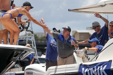 Tampa Bay Lightning owner Jeff Vinik celebrates with fans during the boat parade to celebrate the Tampa Bay Lightning winning the Stanley Cup July 12, 2021 in Tampa, Florida. (Photo by Mike Carlson/Getty Images)