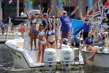 Fans celebrate during the boat parade to celebrate the Tampa Bay Lightning winning the Stanley Cup July 12, 2021 in Tampa, Florida. (Photo by Mike Carlson/Getty Images)