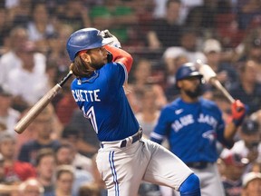 Bo Bichette of the Toronto Blue Jays hits a two run home run in the fifth inning against the Boston Red Sox at Fenway Park on July 26, 2021 in Boston, Massachusetts.