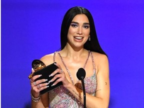 Dua Lipa accepts the Best Pop Vocal Album for 'Future Nostalgia' onstage during the 63rd Annual GRAMMY Awards at Los Angeles Convention Center on March 14, 2021 in Los Angeles, California.