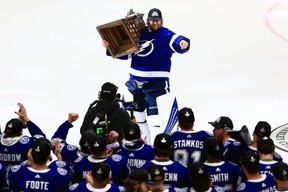 Andrei Vasilevskiy #88 of the Tampa Bay Lightning is presented with the Conn Smythe Trophy after defeating the Montreal Canadiens 1-0 in Game Five to win the 2021 NHL Stanley Cup Final at Amalie Arena on July 7, 2021 in Tampa, Florida. (Photo by Mike Ehrmann/Getty Images)