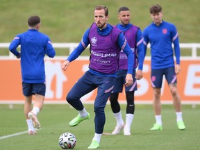 Harry Kane of England passes the ball during the England Training Session at St George's Park in Burton upon Trent, England. Getty Images