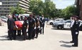 Officers escorted fallen officer Detective Constable Jeffrey Northrup to the funeral home